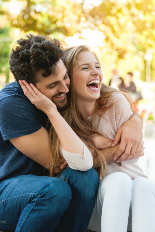 Happy couple reunited after successful Spouse Visa application processed by Dream Rise Education Consultants.